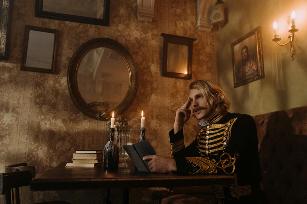 Portrait d'un philosophe méditatif devant un bureau à la bougie, atmosphère baroque